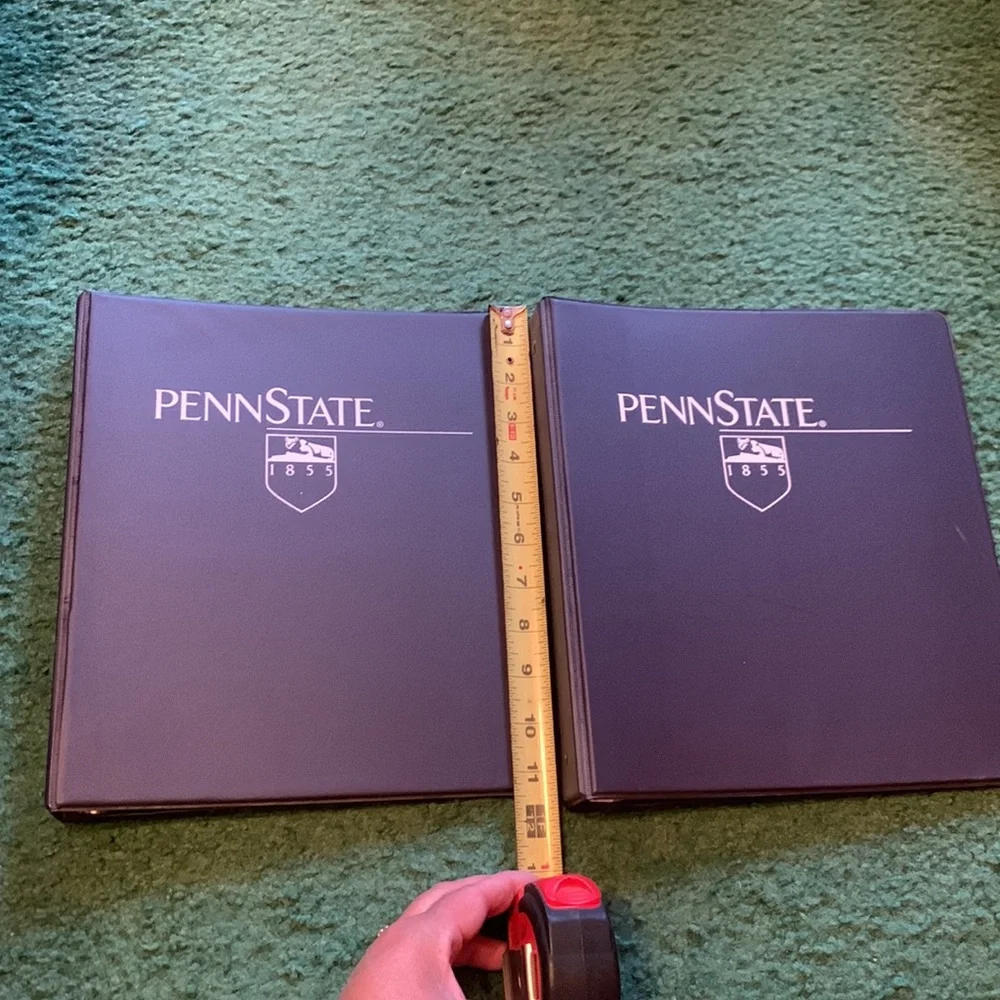 2 Penn state binders. Rough measurements in photos.